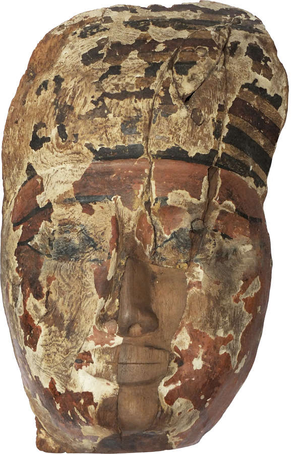 A large and sensitively carved Egyptian wooden mummy mask