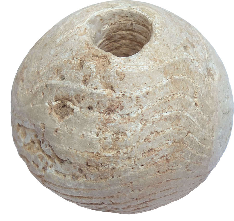 An Egyptian limestone pear-shaped macehead, c. 4000-3000 B.C.