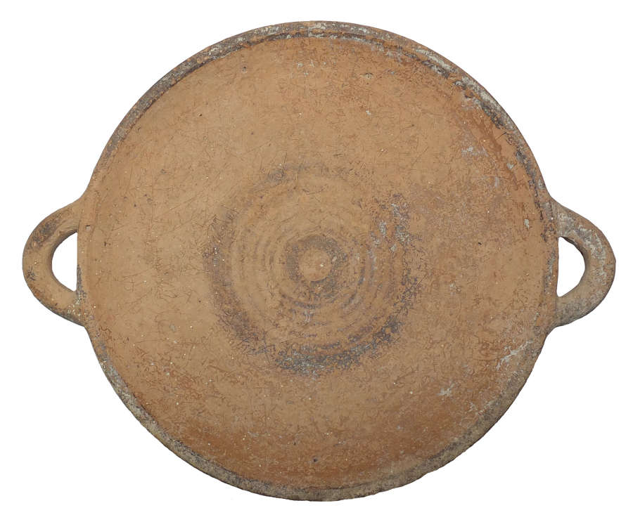 A Cypriote shallow two-handled pottery dish, c. 850-475 B.C.