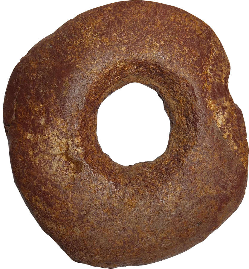 An Egyptian Neolithic discoidal macehead, c. 4th Millennium B.C.