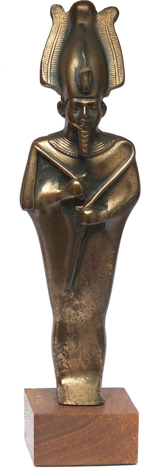 A fine Egyptian bronze standing figure of Osiris, c. 600 B.C.