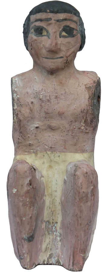 A sizeable Egyptian wooden figure, Middle Kingdom, c. 2000-1800 B.C.
