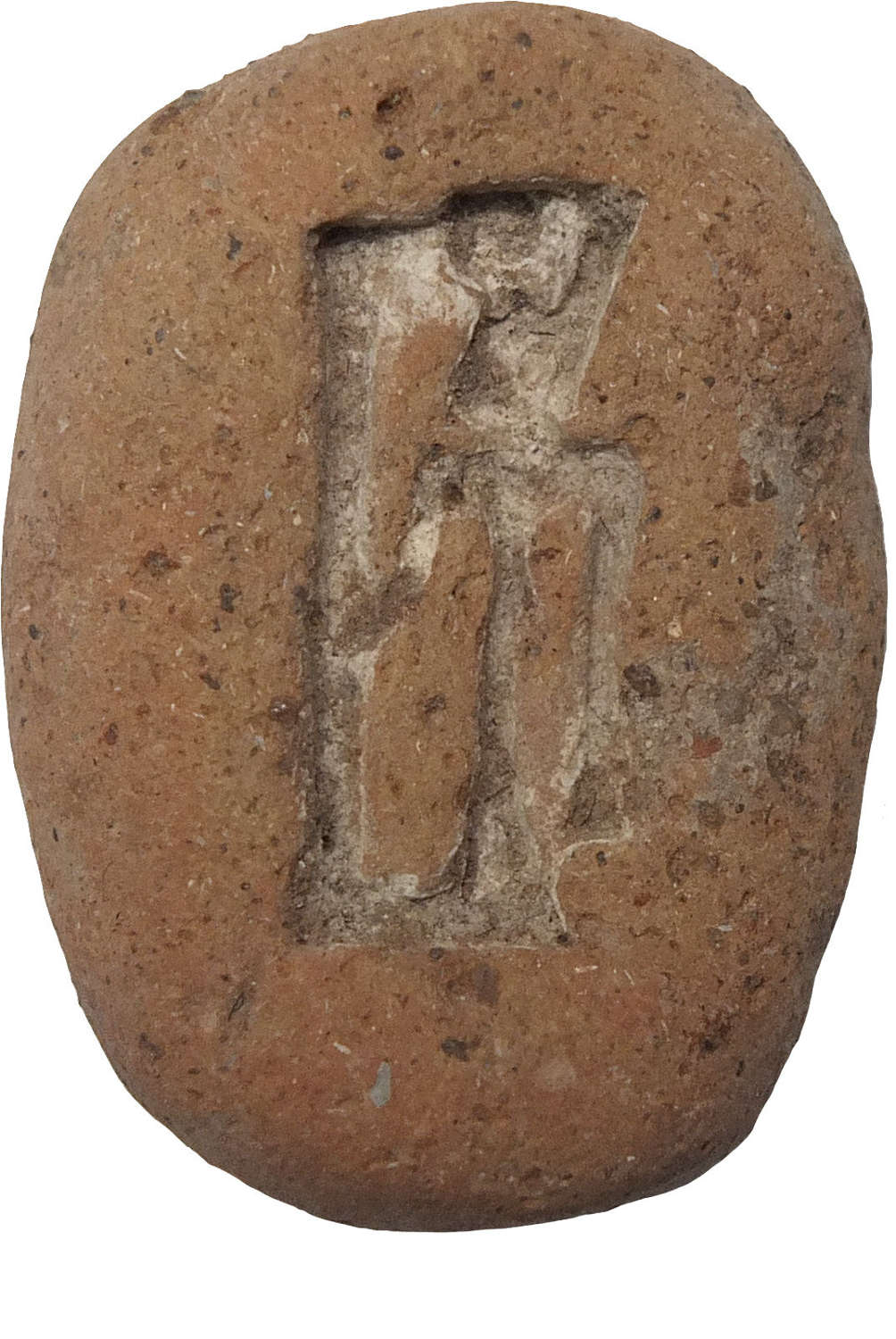 An Egyptian terracotta mould for a small amuletic figural plaque