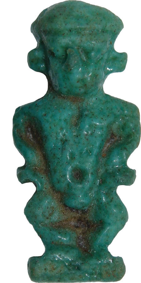 An Egyptian blue-green faience amulet of Ptaichos, c. 600 B.C.