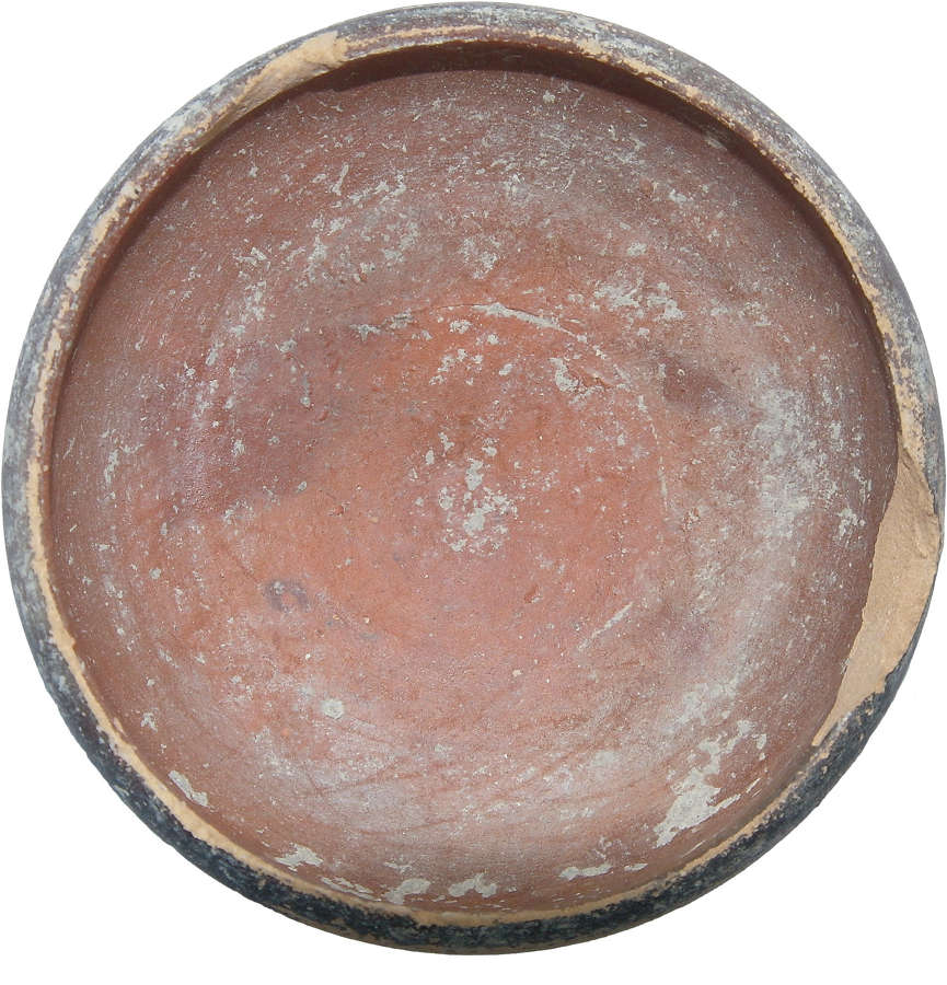 A Greek brown-slipped orange bowl, c. 3rd Century B.C.