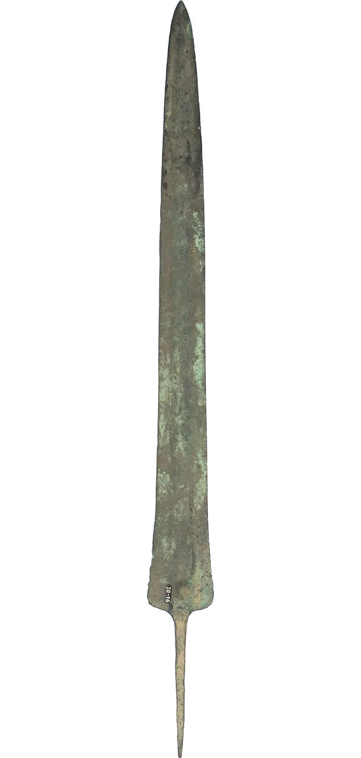 A Luristan tanged bronze spearhead of long slender form