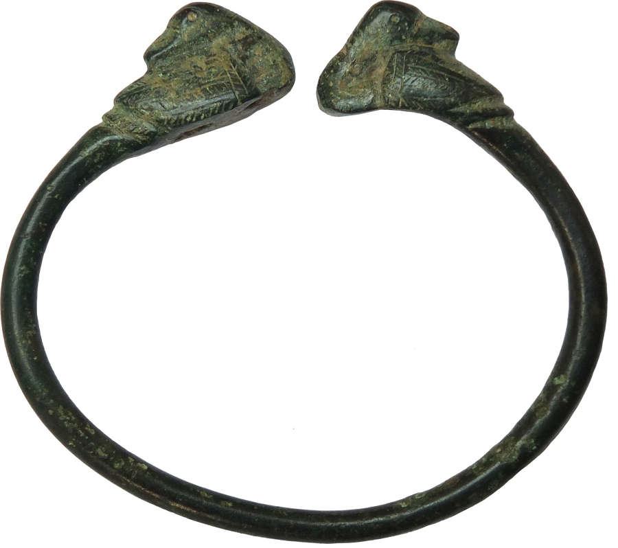 A Luristan bronze bracelet, the terminals modelled as sleeping ducks