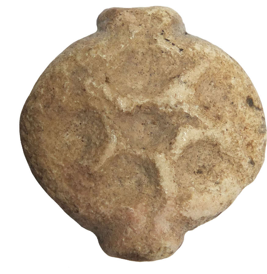 A Jemdet Nasr perforated sub-circular stone stamp seal, c. 3000 B.C.