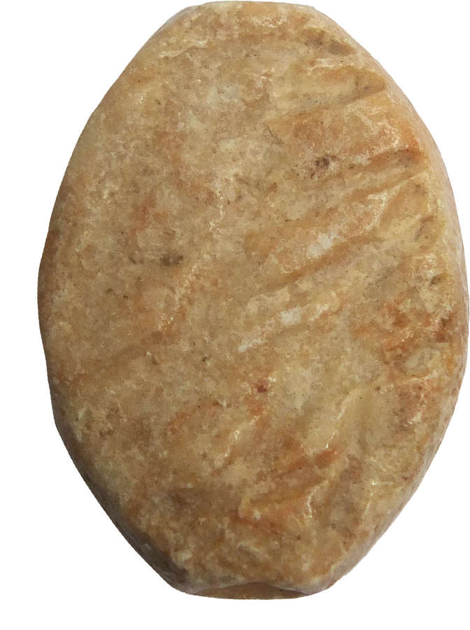 A Jemdet Nasr perforated ellipsoid stone stamp seal, c. 3000 B.C.