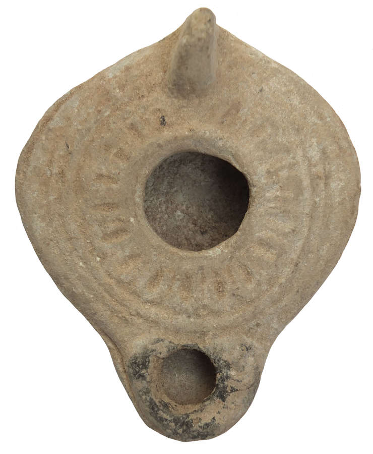 A Byzantine fawn terracotta oil lamp, c. 6th - 7th Century A.D.