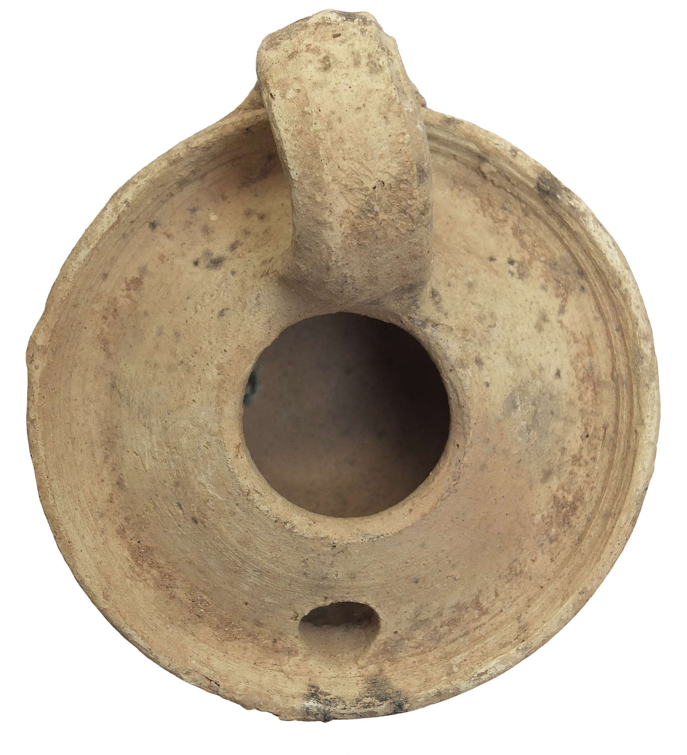 A circular early Islamic pottery oil lamp, c. 8th - 10th Century A.D.
