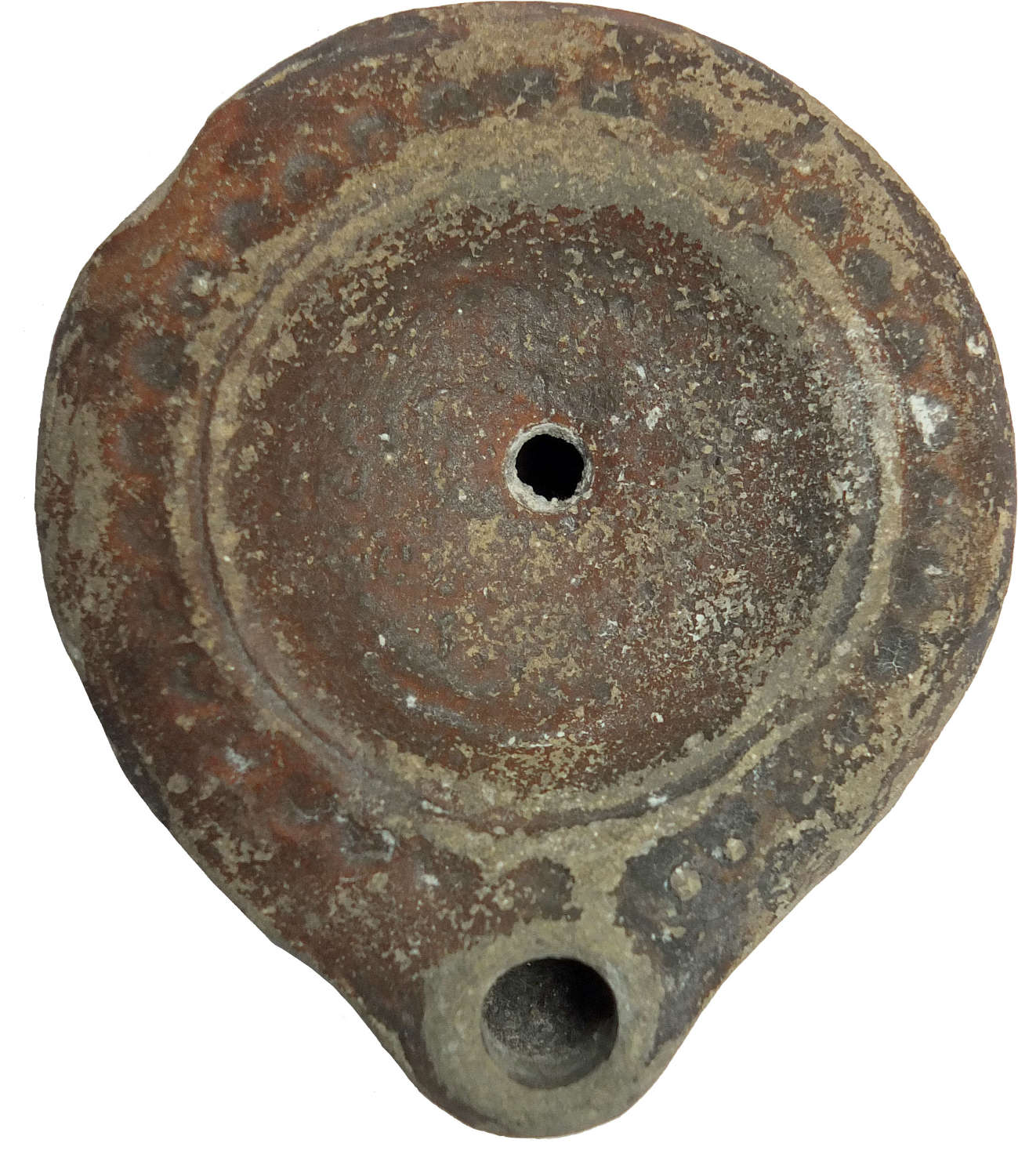 A Roman red-slipped circular oil lamp, c. 1st - 2nd Century A.D.