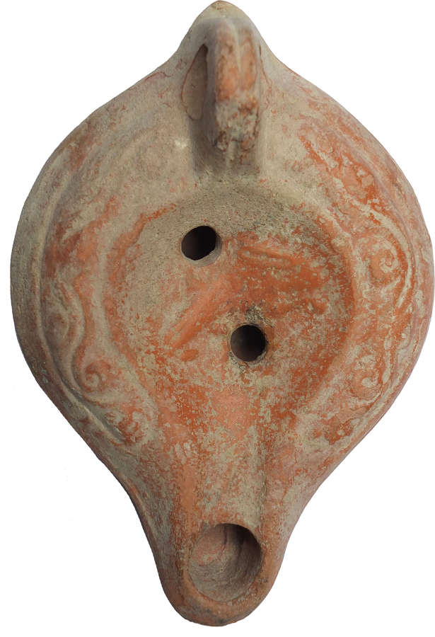 A Roman North African red ware oil lamp, c. 350-450 A.D.