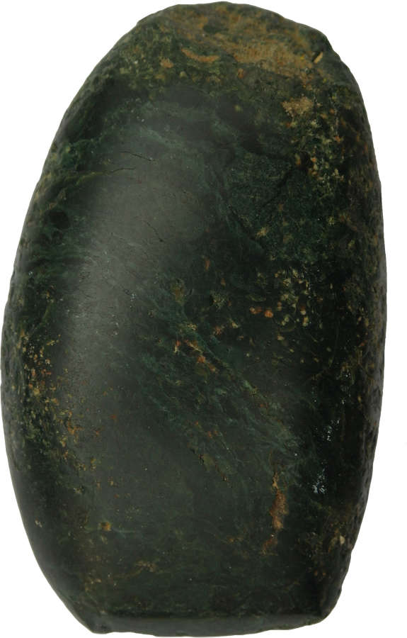 An Olmec dark green jade polished celt