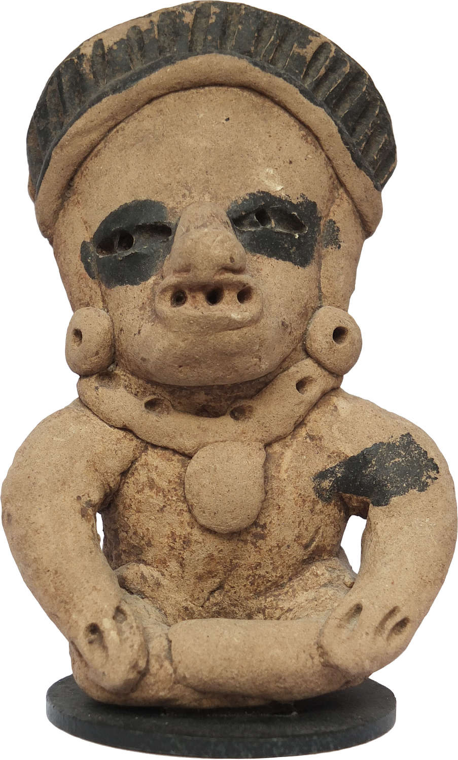 A Mexican Vera Cruz terracotta seated warrior figure, c. 400-600 A.D.