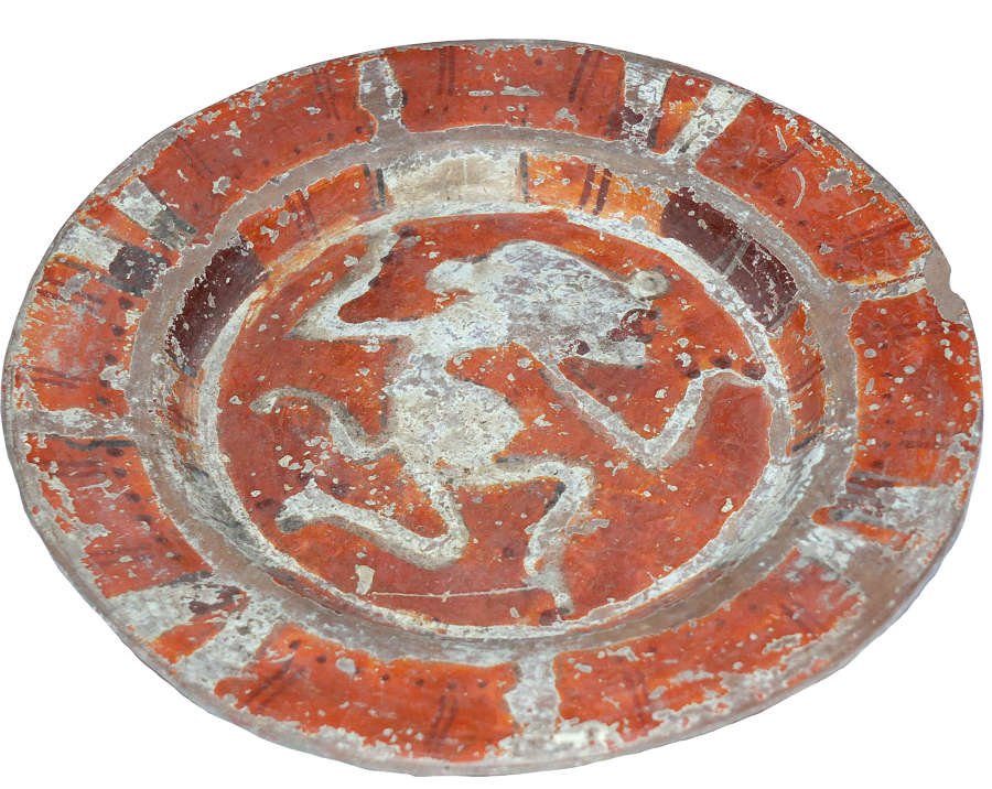 A painted Mixtec plate showing a dancing feline god, Mexico
