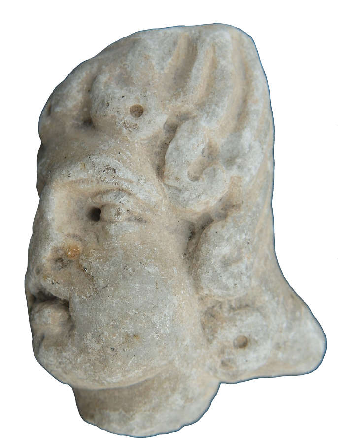 A Roman white marble head of a youth, c. 1st-3rd Century A.D.
