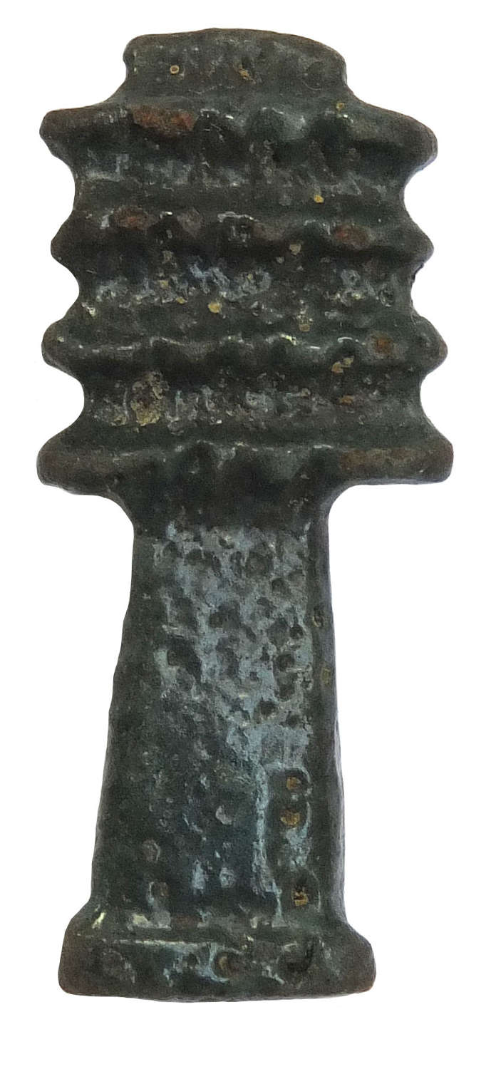 An Egyptian dark blue faience Djed column amulet, c. 730-300 B.C.