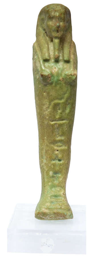 An Egyptian green glazed faience ushabti for Ankh-her, 664-525 B.C.