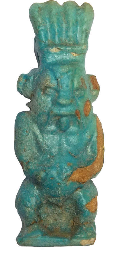 A good-sized Egyptian blue faience amulet of Bes, c. 600-300 B.C.