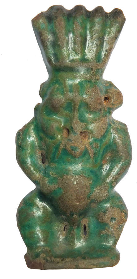 A sizeable Egyptian faience amulet of Bes, Ptolemaic to Roman Period
