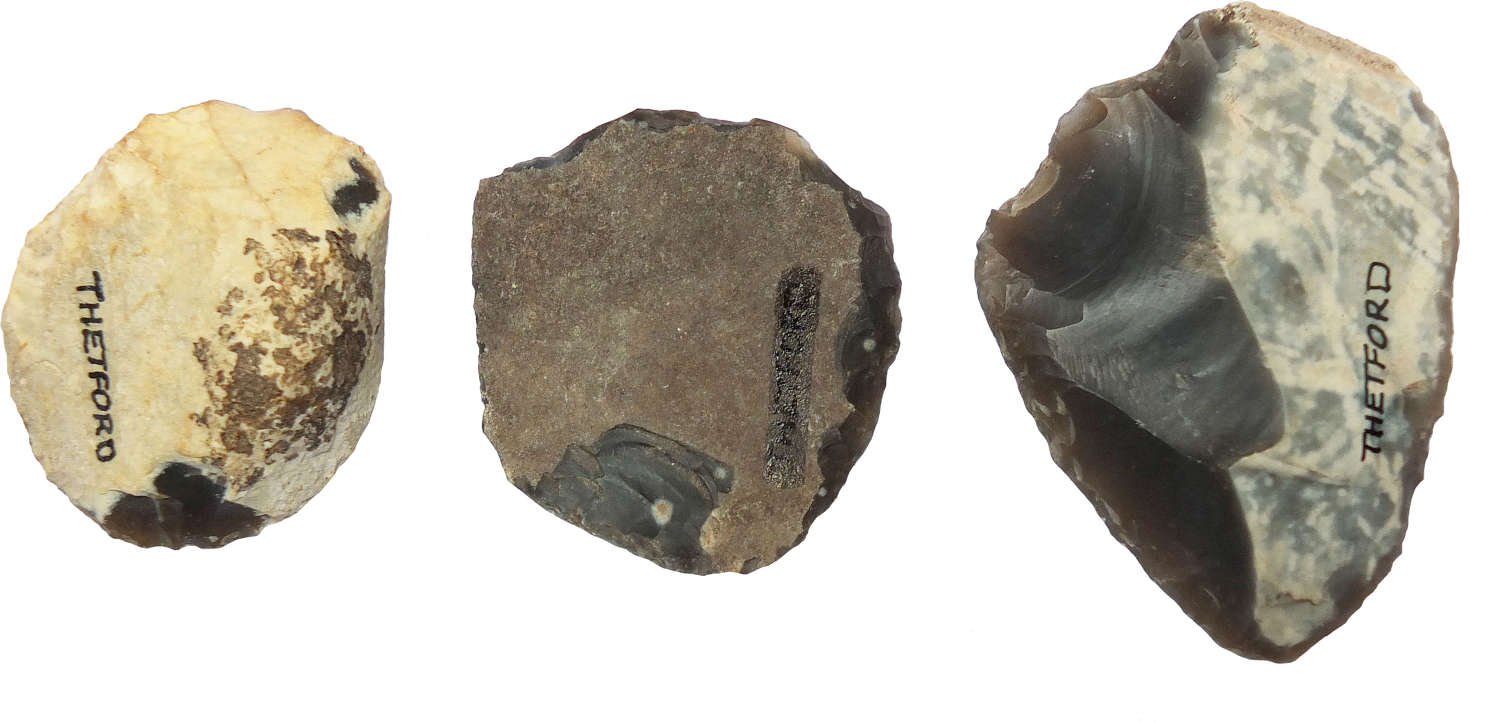 A group of three Neolithic flint scrapers from Thetford, Norfolk