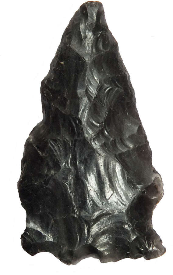 A Mesoamerican triangular obsidian arrowhead, c. 1st Millennium A.D.