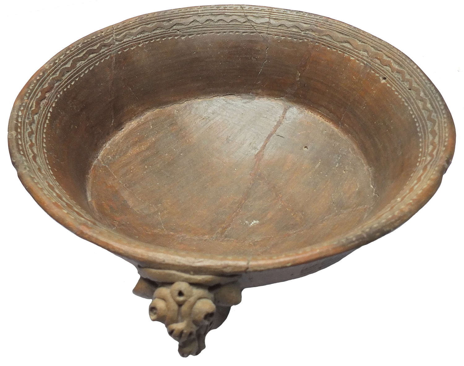 A large Costa Rican terracotta tripod bowl with zoomorphic figure