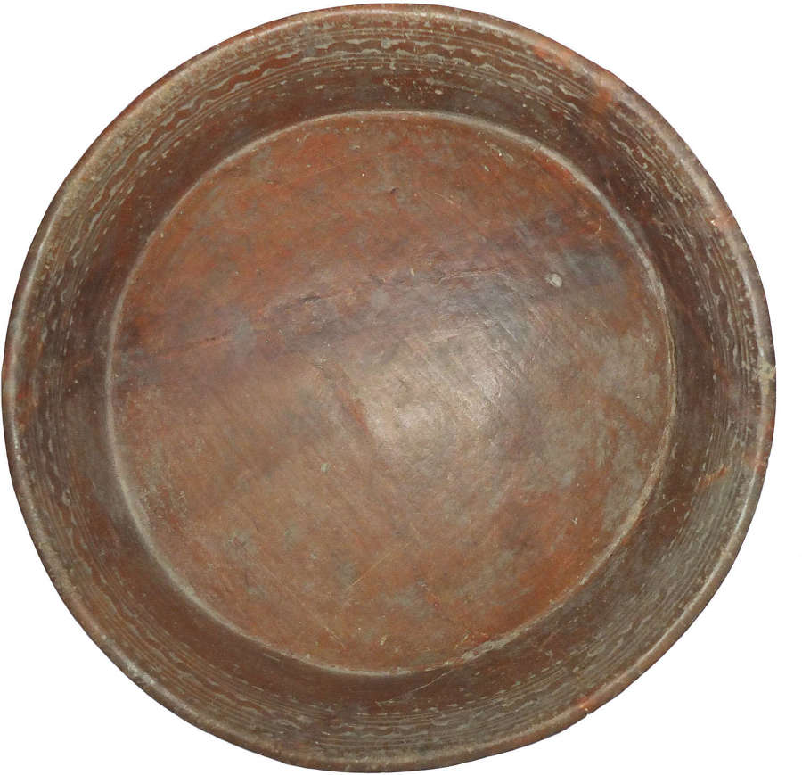 A Costa Rican terracotta tripod bowl with zoomorphic rattle feet