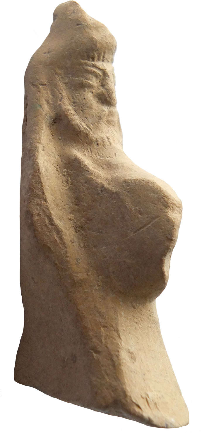 A Parthian fawn terracotta horse and rider figure