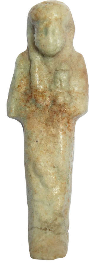 An Egyptian glazed faience ushabti, c. 1069-747 B.C.