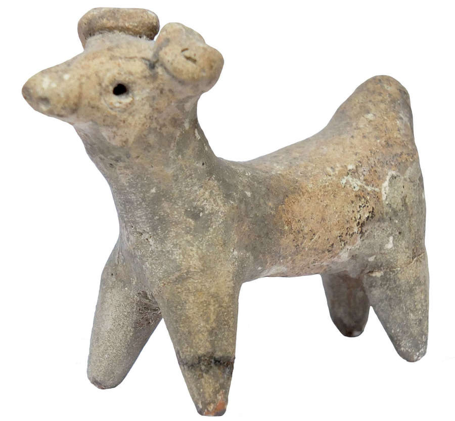 A Syrian fawn terracotta bull, c. 2nd Millennium B.C.