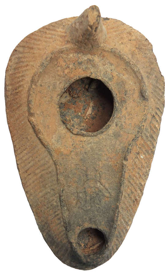 A large Syro-Palestinian pottery oil lamp, c. 5th Century A.D.