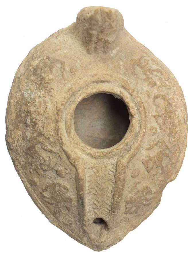 A Syro-Palestinian terracotta oil lamp, c. 6th-7th Century A.D.