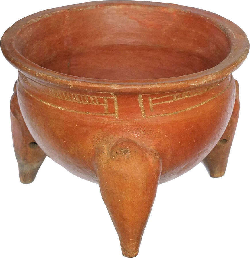 A Costa Rican orange terracotta tripod vessel, c. 800-1500 A.D.
