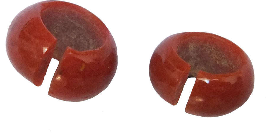 Two Egyptian red glass hair rings, c. 1550-1069 B.C.