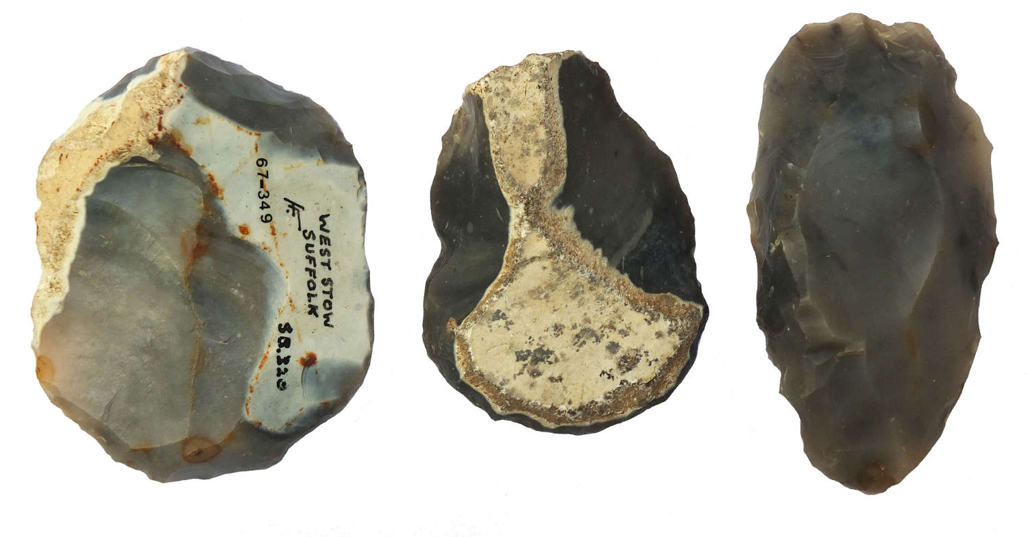 A group of three Neolithic grey flint scrapers from West Stow, Suffolk