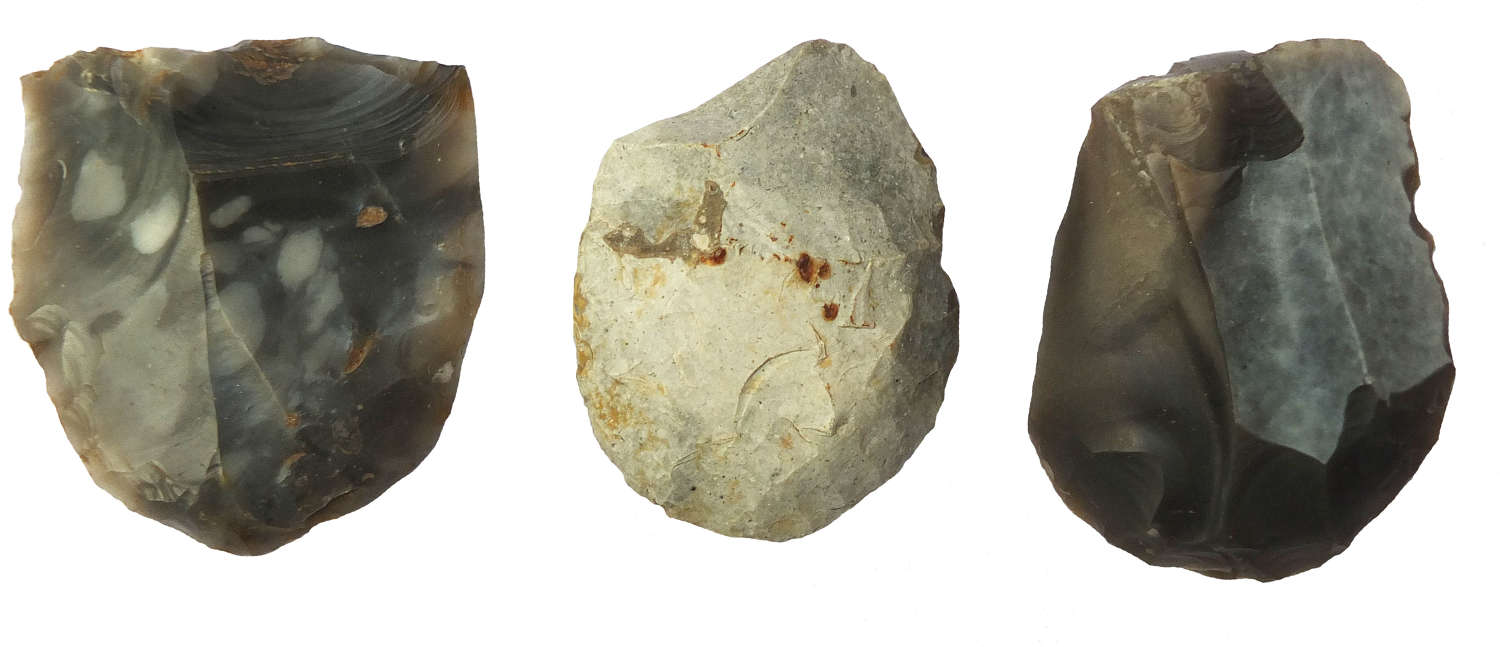 A group of three Neolithic grey flint scrapers from Suffolk