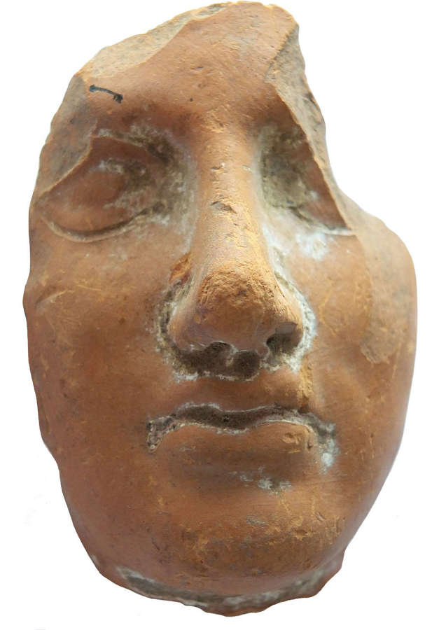 A facial fragment from a large Hellenistic terracotta figure