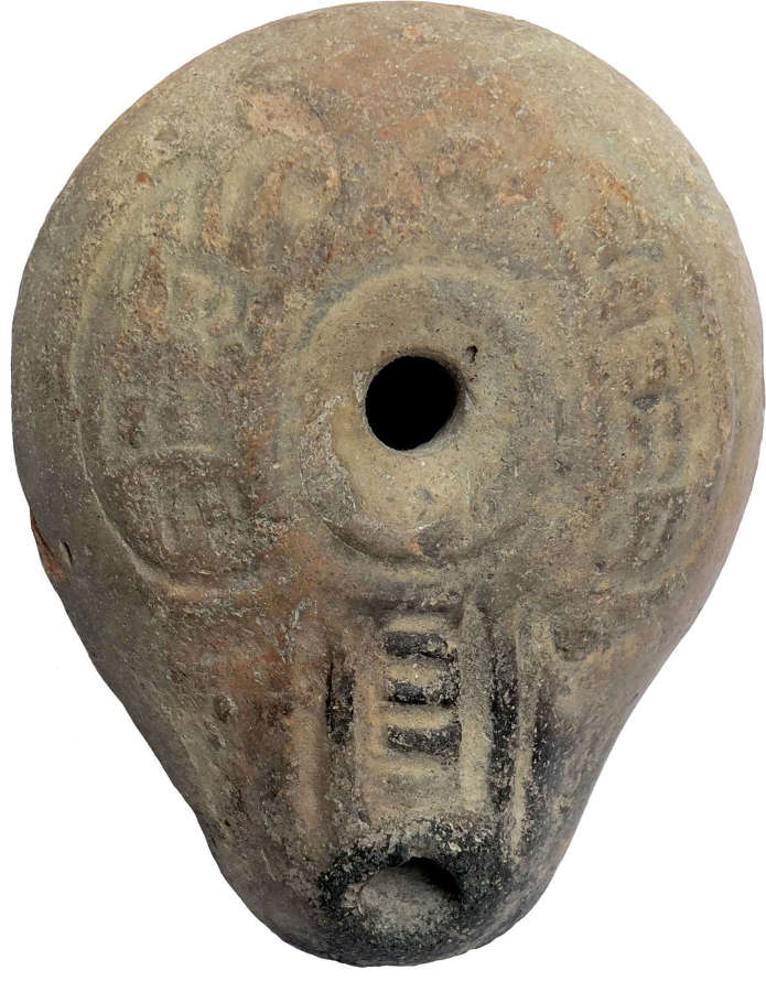 A Romano-Egyptian terracotta oil lamp, c. 3rd-4th Century A.D.