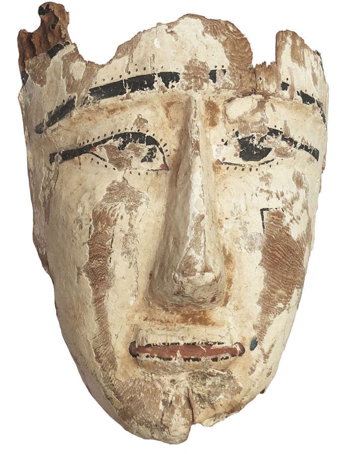 An Egyptian wooden mummy mask, Ptolemaic to Roman Period