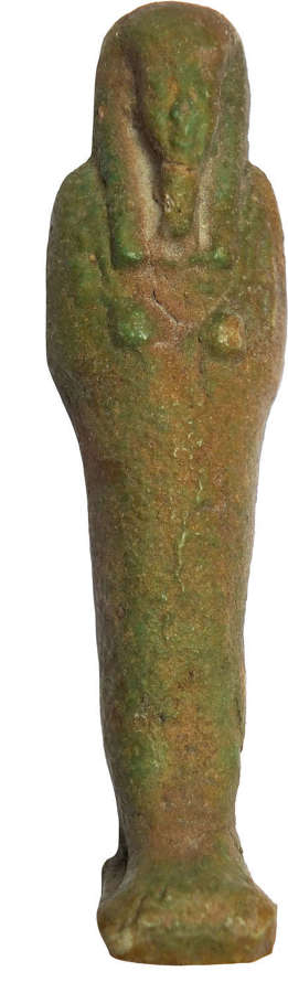An Egyptian uninscribed green glazed faience ushabti, c. 600-300 B.C.
