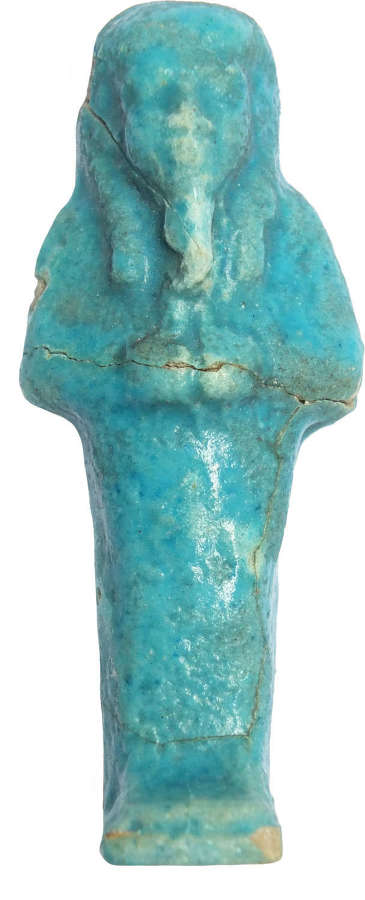 An Egyptian blue faience ushabti of Ankh-ef-en-Khonsu, c. 700 B.C.