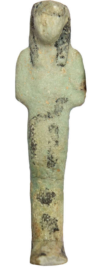 An Egyptian slender pale green faience ushabti, c. 1069-747 B.C.