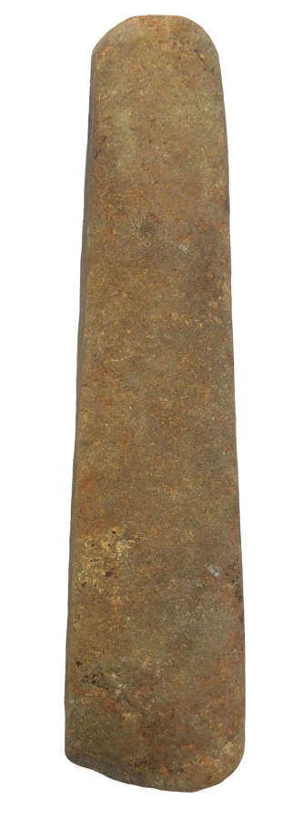 A grey hardstone parallel-sided chisel, c. 3rd Millennium B.C.