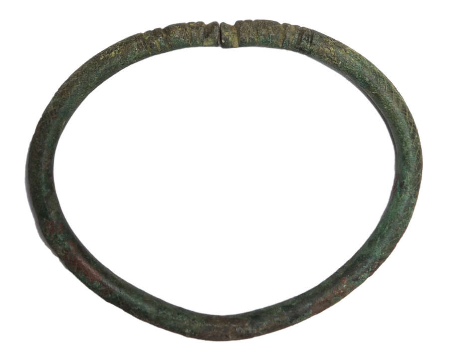 A Near Eastern cast bronze bracelet or anklet, c.10th-8th Century B.C.