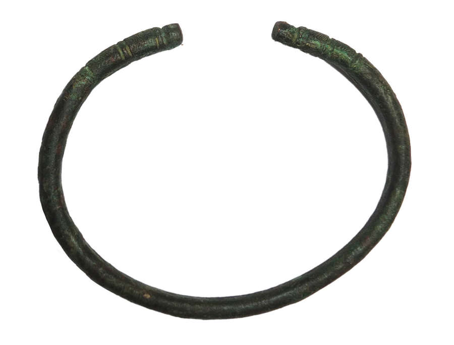 A Near Eastern cast bronze bracelet or anklet, c.10th-8th Century B.C.